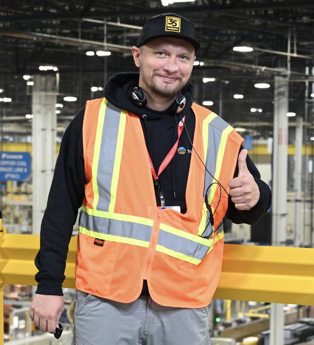 Andrew Kuznetsov, owner of Bay Area Refrigeration Service, in a safety vest during manufacturer service training