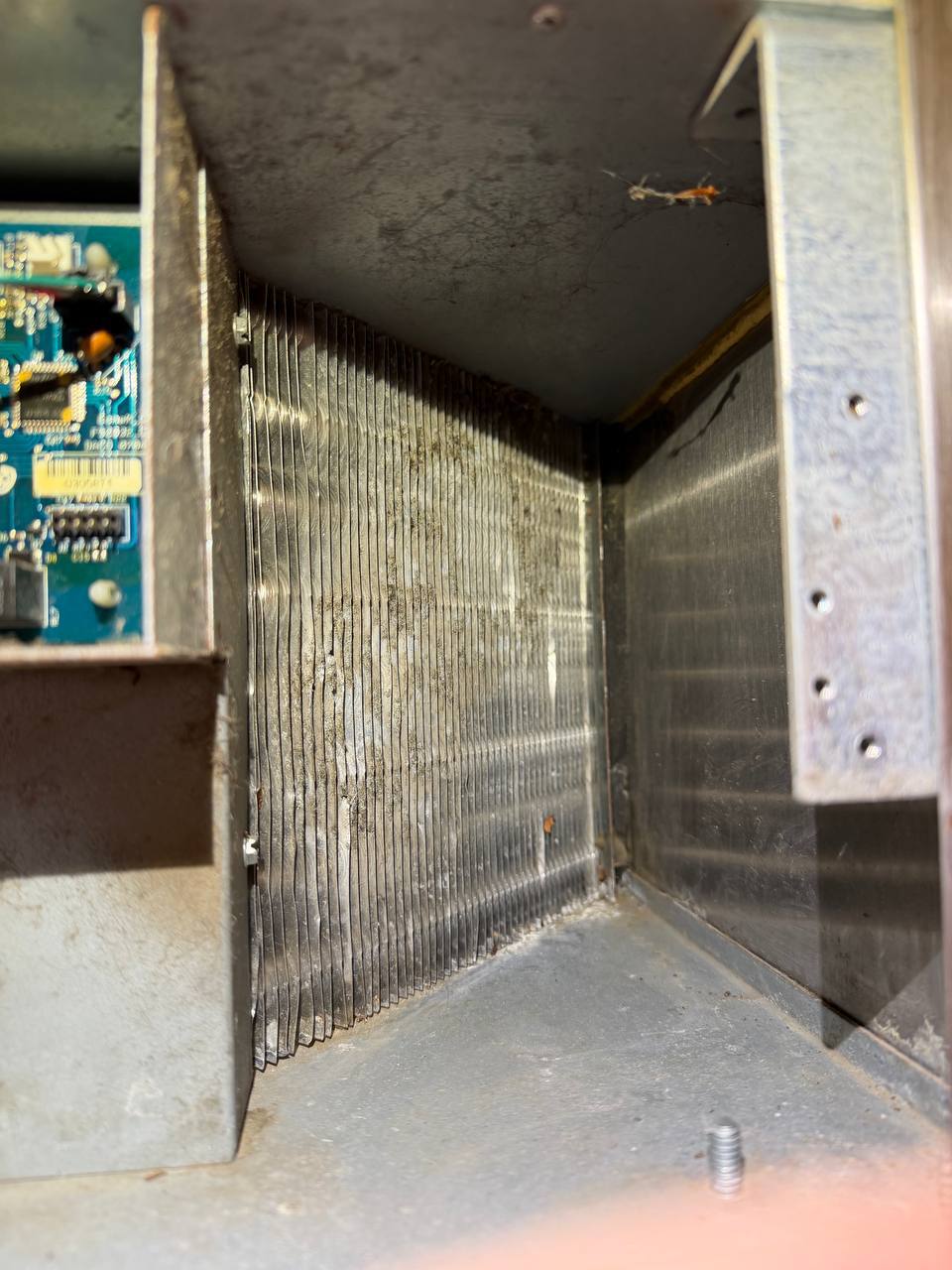 The same U-Line condenser coil after cleaning, aluminum fins fully clear